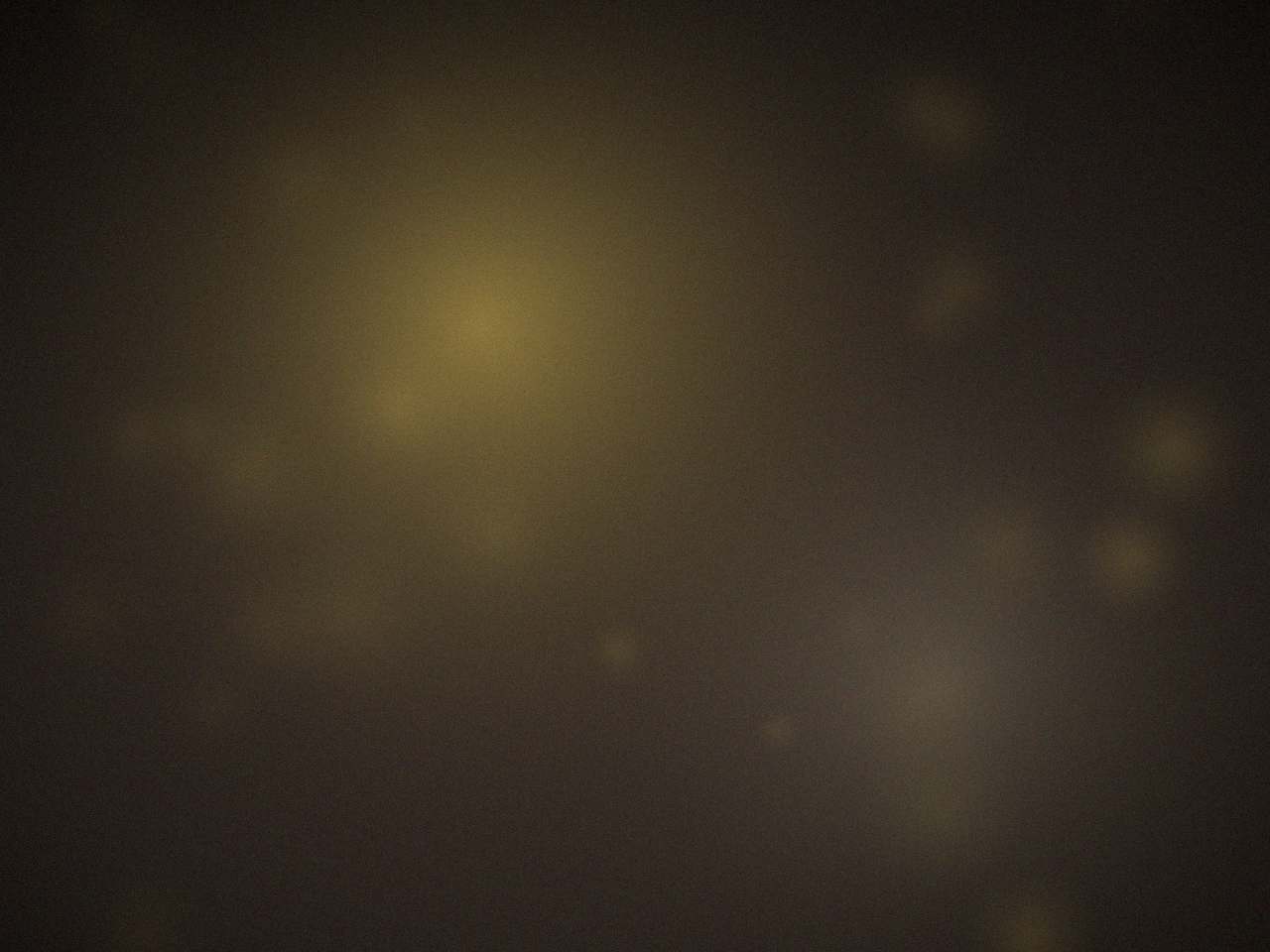 Warm light over a dark field - placeholder standing in for a photograph of the family kitchen.